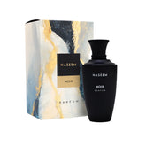 Noir Parfum black bottle with artistic marble-effect packaging in gold, black and white tones
